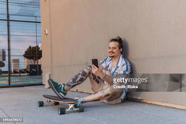 taking a break - man skating stock pictures, royalty-free photos & images