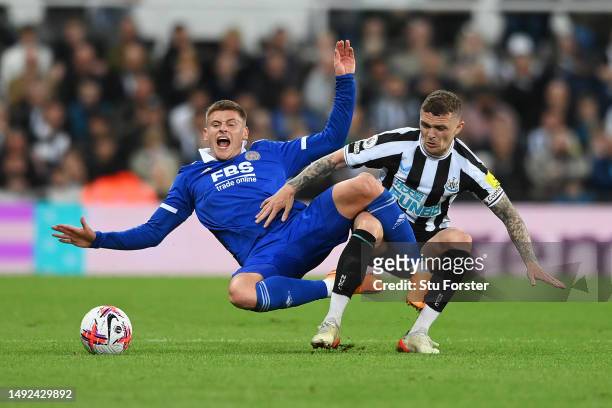Harvey Barnes of Leicester City is challenged by Kieran Trippier of Newcastle United during the Premier League match between Newcastle United and...