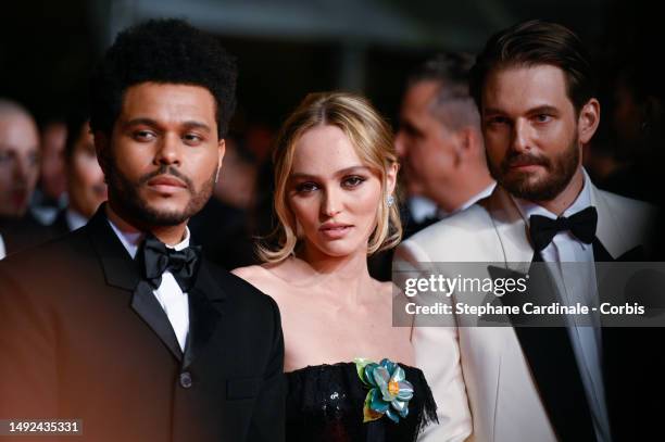 Abel “The Weeknd” Tesfaye, Lily-Rose Depp and Sam Levinson attend the "The Idol" red carpet during the 76th annual Cannes film festival at Palais des...