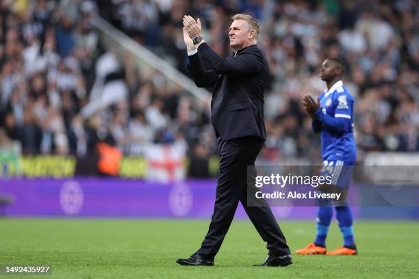 Dean Smith, Manager of Leicester City, applauds the fans following the Premier League match between Newcastle United and Leicester City at St. James...