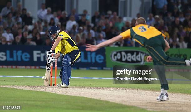 Neil McKenzie of Hampshire scores the match winning run off the final ball during the Friends Life T20 match between Nottinghamshire and Hampshire at...