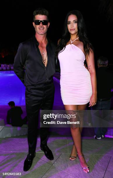 Robin Thicke and April Love Geary attend 'BOSS Loves Naomi', a special birthday event for Naomi Campbell, hosted by Daniel Grieder, on May 22, 2023...