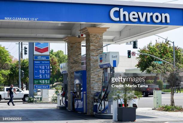 The Chevron logo is displayed at a Chevron gas station on May 22, 2023 in Burbank, California. Chevron is doubling down in the shale sector with an...
