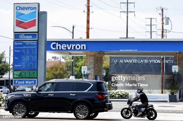 The Chevron logo is displayed at a Chevron gas station on May 22, 2023 in Burbank, California. Chevron is doubling down in the shale sector with an...