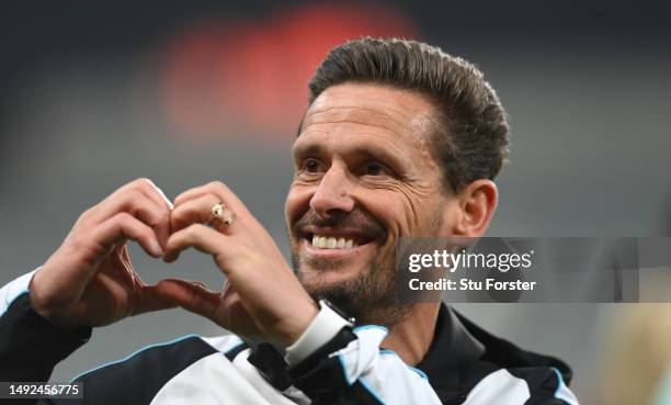 Newcastle coach Jason Tindall smiles and makes a heart shape with his hands after the Premier League match between Newcastle United and Leicester...