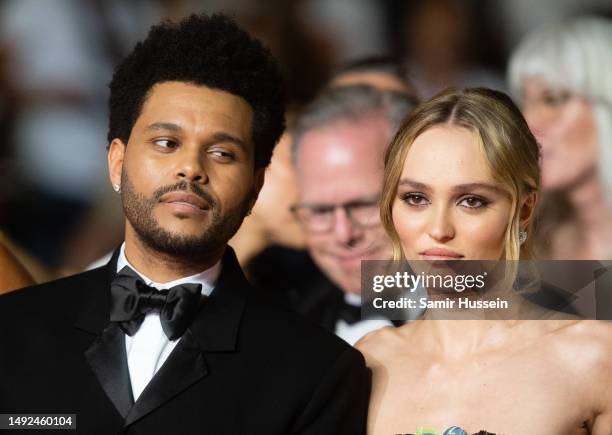 Lily-Rose Depp and Abel Makkonen Tesfaye, The Weeknd attend the "The Idol" red carpet during the 76th annual Cannes film festival at Palais des...