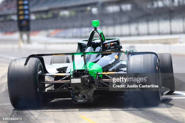 Callum Ilott, driver of the Juncos Hollinger Racing Chevrolet, leaves the pits during practice of the 107th Running of the Indianapolis 500 at...