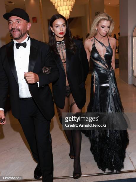 Riccardo Tisci, Irina Shayk and Stella Maxwell are seen at the Hotel Martinez during the 76th Cannes film festival on May 22, 2023 in Cannes, France.