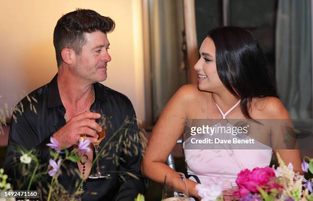 Robin Thicke and April Love Geary attend 'BOSS Loves Naomi', a special birthday event for Naomi Campbell, hosted by Daniel Grieder, on May 22, 2023...