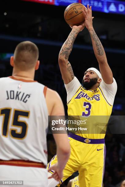 Anthony Davis of the Los Angeles Lakers shoots the ball against the Denver Nuggets during the first quarter in game four of the Western Conference...