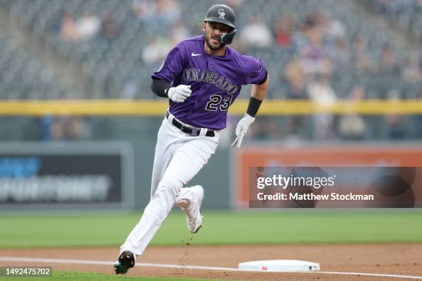 Kris Bryant of the Colorado Rockies scores on a Elias Diaz double against the Miami Marlins in the first inning at Coors Field on May 22, 2023 in...