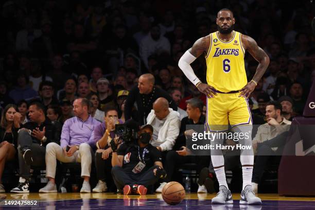LeBron James of the Los Angeles Lakers reacts to a foul during the first quarter against the Denver Nuggets in game four of the Western Conference...