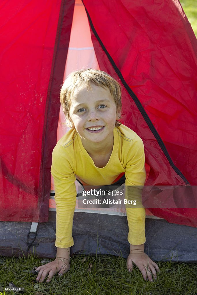 Portrait of boy in tent