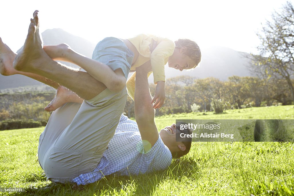 Father and son playing together