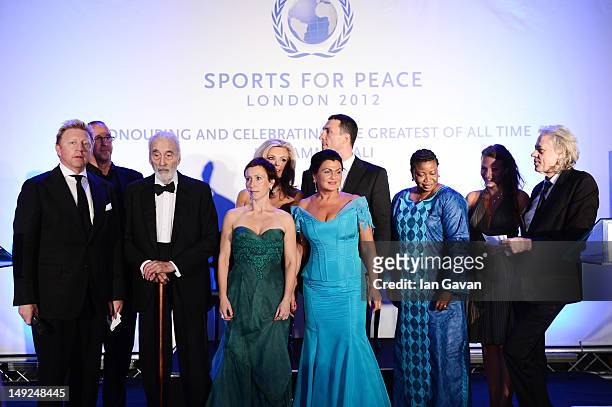 Boris Beck, Sir Christopher Lee, Wladimir Klitschko, Fatou Bensouda, Sir Bob Geldof and guests onstage at the Sports For Peace Fundraising Ball at...