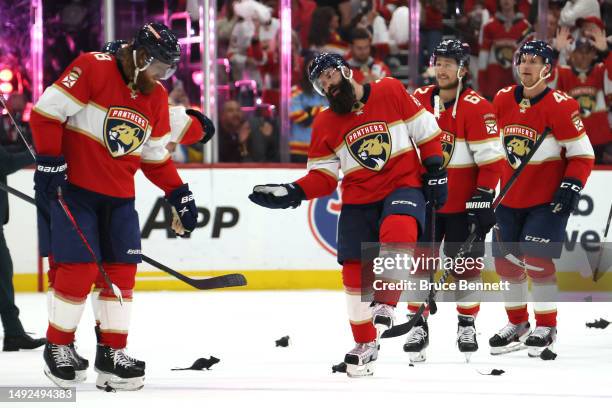 Radko Gudas of the Florida Panthers celebrates with Marc Staal of the Florida Panthers after defeating the Carolina Hurricanes in Game Three of the...