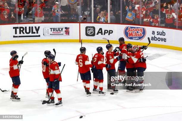 The Florida Panthers celebrate after defeating the Carolina Hurricanes in Game Three of the Eastern Conference Final of the 2023 Stanley Cup Playoffs...