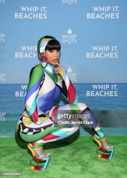 Cardi B poses as Whipshots presents Summer Cocktails with Cardi at The Bungalow on May 22, 2023 in Santa Monica, California.