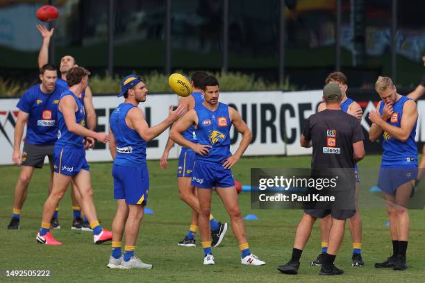 Luke Shuey and Liam Duggan look on during a West Coast Eagles training session at Mineral Resources Park on May 23, 2023 in Perth, Australia.