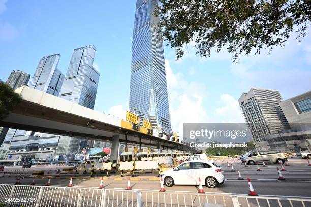 kowloon staion and western harbour crossing, hong kong - western harbour tunnel stock pictures, royalty-free photos & images