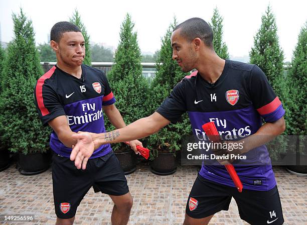 Alex Oxlade-Chamberlain and Theo Walcott of Arsenal FC are given a lesson in Kung Fu by Zhang Yuxan a Traditional Kung Fu Master in the St. Regis...