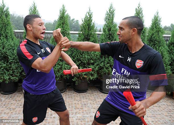 Alex Oxlade-Chamberlain and Theo Walcott of Arsenal FC are given a lesson in Kung Fu by Zhang Yuxan a Traditional Kung Fu Master in the St. Regis...