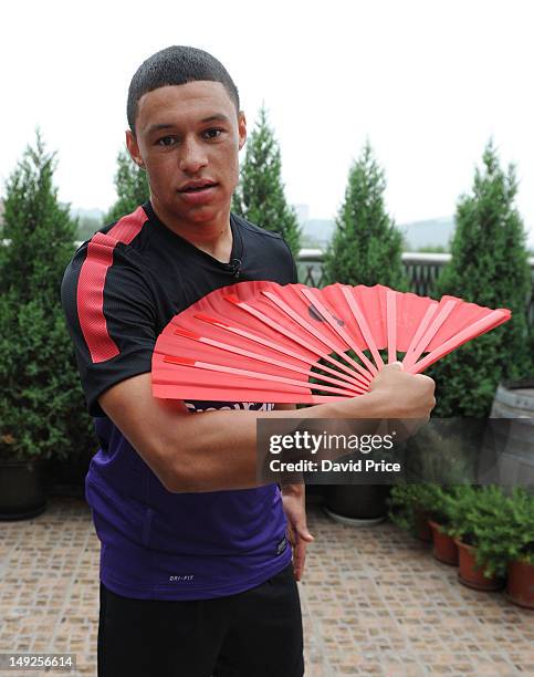 Alex Oxlade-Chamberlain of Arsenal FC is given a lesson in Kung Fu by Zhang Yuxan a Traditional Kung Fu Master in the St. Regis Hotel, in Beijing...