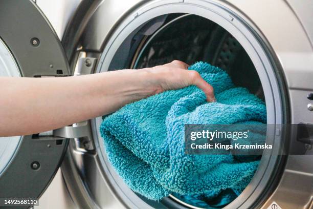 washing towels - towel stock-fotos und bilder