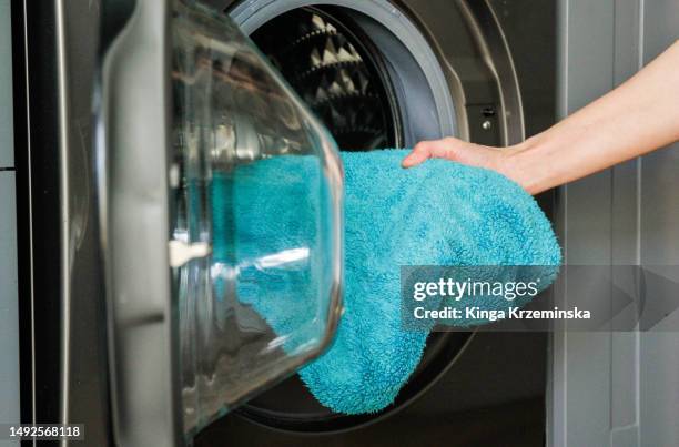 washing towels - washing stock pictures, royalty-free photos & images