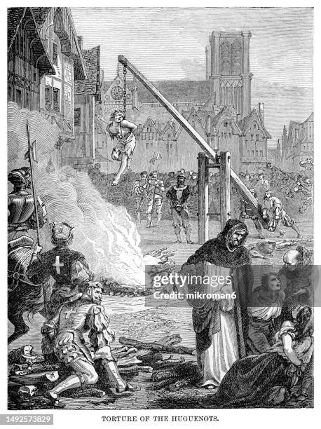 old engraved illustration of torture of huguenots - torture stock pictures, royalty-free photos & images