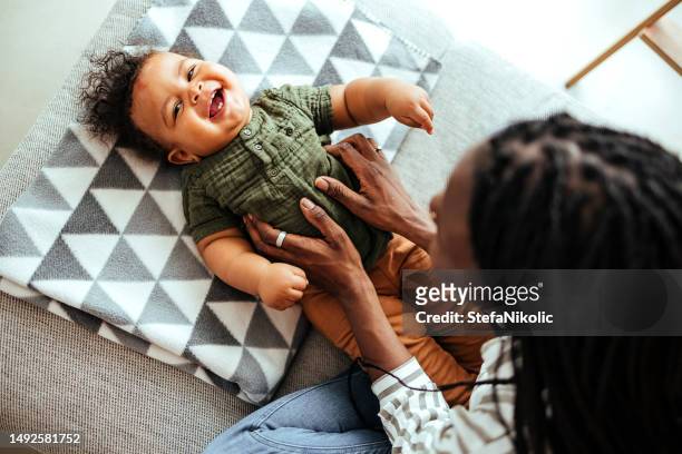 i like it when mom plays with me - tickling stock pictures, royalty-free photos & images