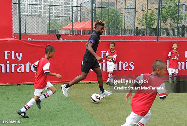 Alex Song of Arsenal attend an Emirates Soccer Clinic in Beijing during their pre-season Asian Tour in China on July 26 2012 in Beijing, China.