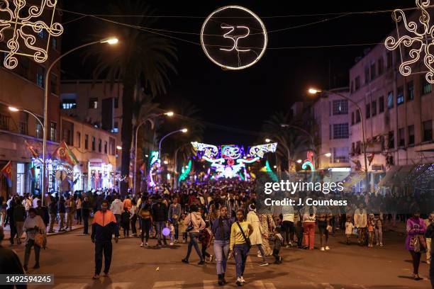 Thousands of people walk along Harnet Avenue during an Independence Day celebration on May 22, 2023 in Asmara, Eritrea. Eritrea gained its...