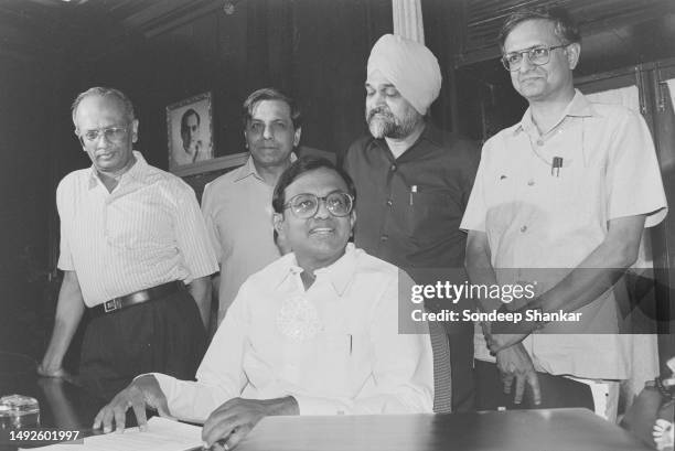 Chidambaram with officers after taking over as the Finance Minister of the newly formed Janta Dal government in New Delhi on June 03, 1996.