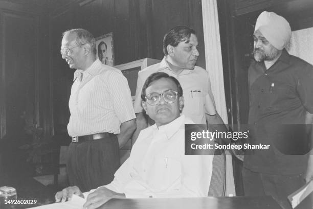 Chidambaram with officers after taking over as the Finance Minister of the newly formed Janta Dal government in New Delhi on June 03, 1996.