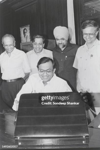 Chidambaram with officers after taking over as the Finance Minister of the newly formed Janta Dal government in New Delhi on June 03, 1996.