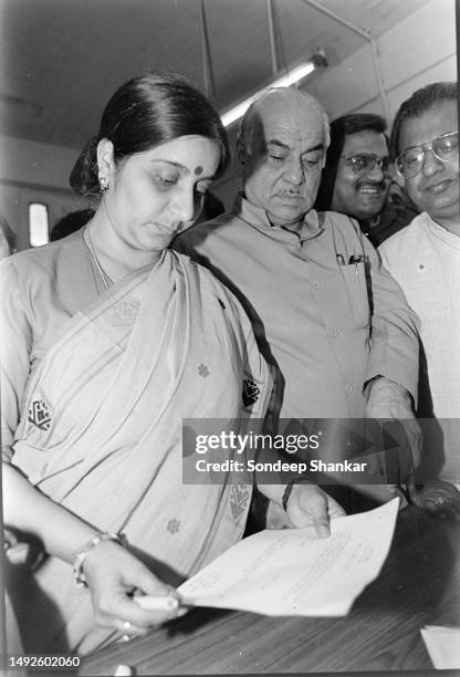 Senior Bhartiya Janta Party leader Sushma Swaraj accompanied by Madan Lal Khurana filling her nomination papers from New Delhi constituency for the...