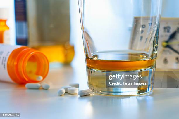 pills and alcohol, studio shot - tablet alcohol stock pictures, royalty-free photos & images