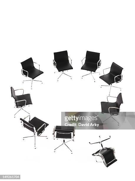 corporate chairs forming circle on white background, one upside down - system failure stock pictures, royalty-free photos & images