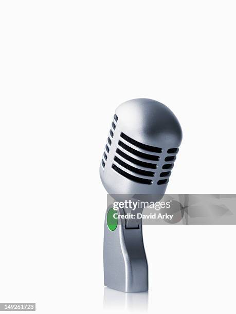 studio shot of vintage-themed modern microphone on white background - マイクスタンド ストックフォトと画像