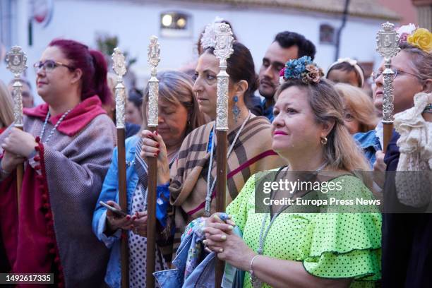 Several pilgrims pray during the departure of the brotherhoods of El Rocio in the town of Benacazon, on May 23, 2023 in Seville . The pilgrimage of...