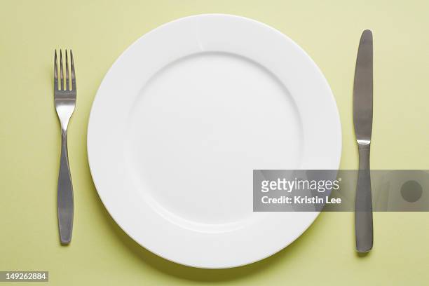 studio shot of place setting - silverware stock pictures, royalty-free photos & images