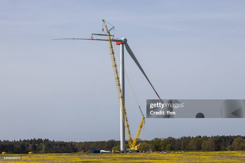 Generator Rotor Lift Wind Turbine Construction Site Giant Crane Lifts A Rotor Blade To The ...
