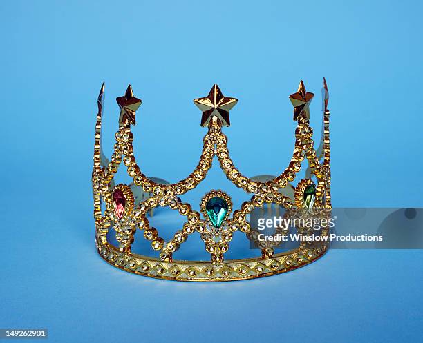studio shot of gold tiara - tiara stock-fotos und bilder