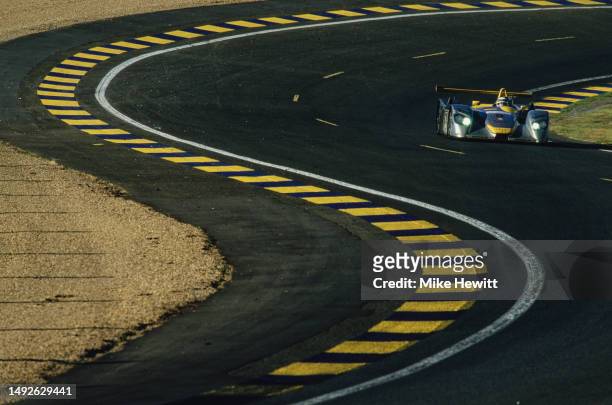 Allan McNish from Scotland drives the Audi Sport Team Joest Audi R8 Audi V8 through the Esses during the 24 Hours of Le Mans endurance race on 17th...