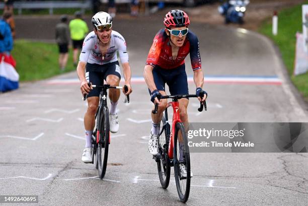 João Almeida of Portugal and UAE Team Emirates - White best young jersey and Geraint Thomas of The United Kingdom and Team INEOS Grenadiers attack in...