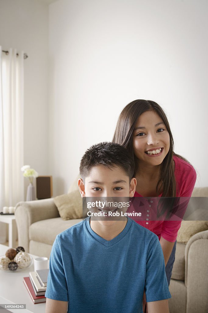 USA, California, Los Angeles, Portrait of smiling brother (10-11) and sister (12-13)