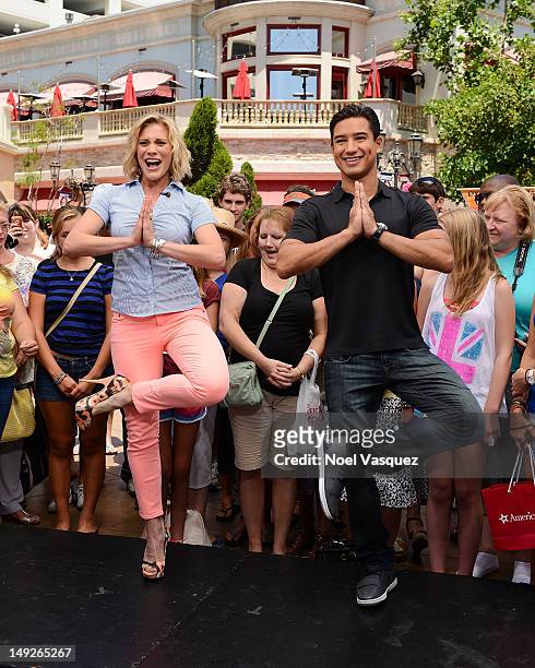Katee Sackoff and Mario Lopez visit "Extra" at The Grove on July 25, 2012 in Los Angeles, California.