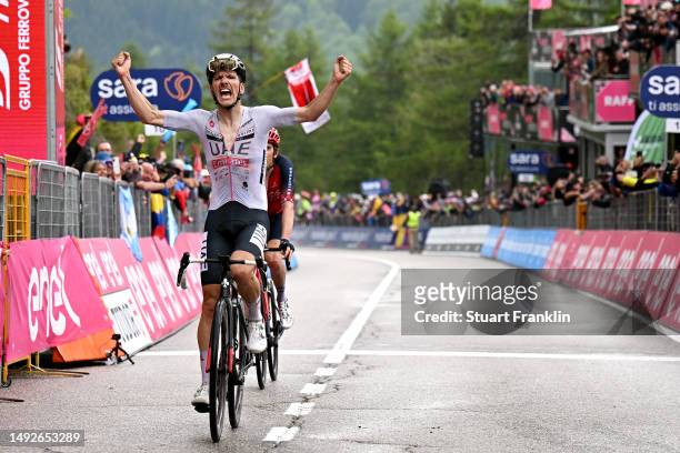 João Almeida of Portugal and UAE Team Emirates - White best young jersey celebrates at finish line as stage winner during the 106th Giro d'Italia...