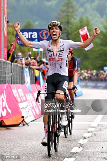 João Almeida of Portugal and UAE Team Emirates - White best young jersey celebrates at finish line as stage winner during the 106th Giro d'Italia...